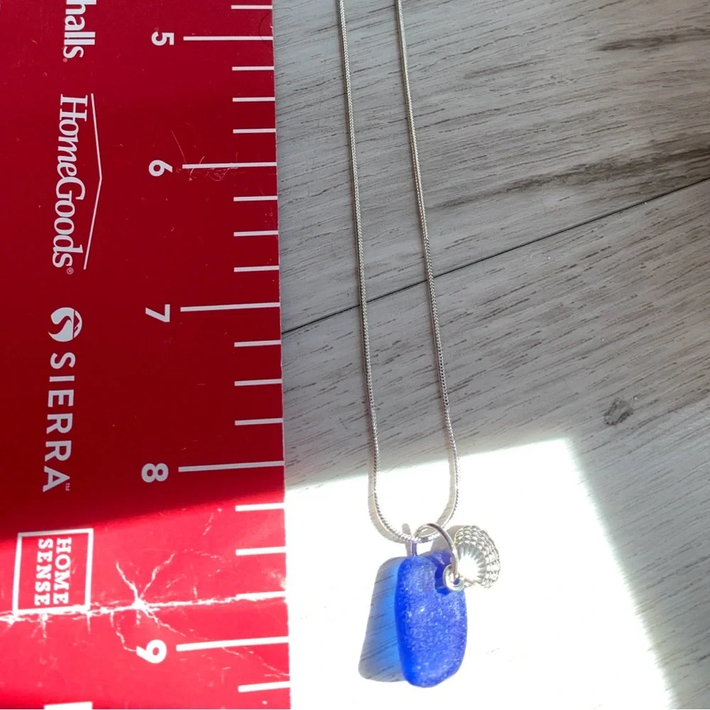 Real sea glass pendant, rare blue piece with sea shell charm